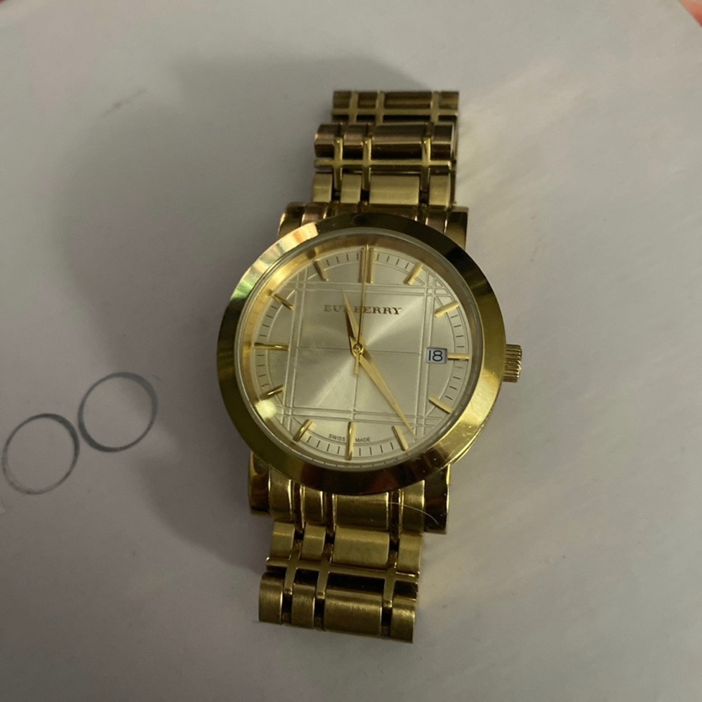 Women’s gold Burberry watch
